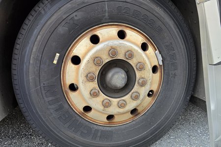 Here is a photo of one of the front tires with the wheel on it before any cleaning work had been done.  This what years of Charleston grime looks like.