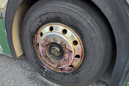 In-progress shot of the cleaning.  What little had already been cleaned was like night and day, as those rims were cleaner than they had been in likely quite some time.