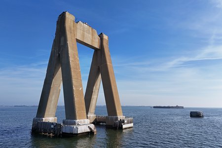 One of two triangular piers, this one more to the northeast, which held up the truss section of the bridge.  This pier was not struck by the Dali, and acted as something of a pivot point as the bridge gave way.