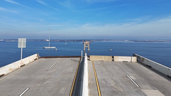 The edge of the roadway from the Hawkins Point side, facing the other side.