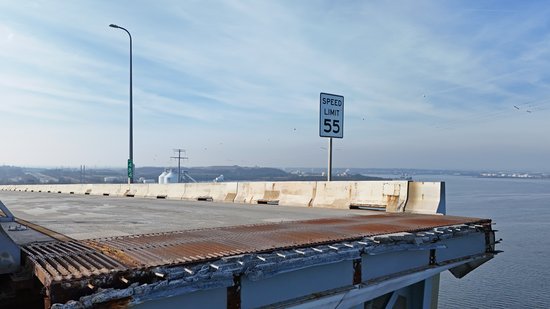 Seeing a sign indicating a speed limit of 55 adjacent to the end of the roadway was an eerie reminder that what we were seeing was not normal nor planned.  My first thought upon seeing the sign still mounted there was, "55?  Yeah, good luck with that."