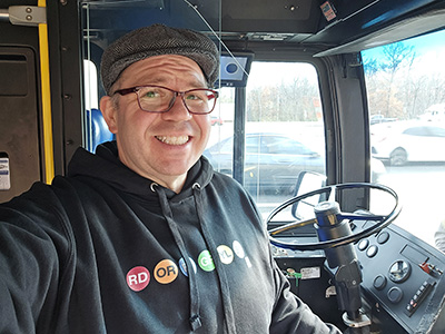 Selfie inside the bus.  Note the hoodie that I am wearing, which I felt fit the part.