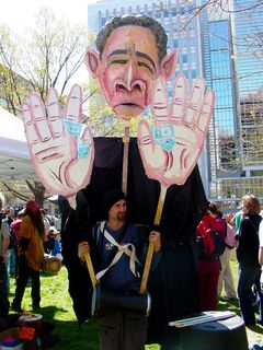 This particular street puppet, with a likeness of George W. Bush on one side, and a skull on the other, makes another appearance at a demonstration, having made a previous appearance at J20.