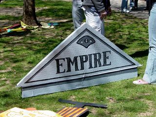 A triangular cardboard cutout simply reads "Empire".