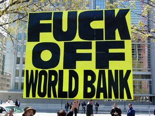 The gentleman who, for J20, carried a giant sign dropping F-bombs on George W. Bush, changed his sign accordingly, now referring to the World Bank and the IMF.