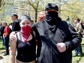 Sis agreed to take a photo of Jess and I with Big Mavica. As you can see, the Black Bloc look is "in" at these events.