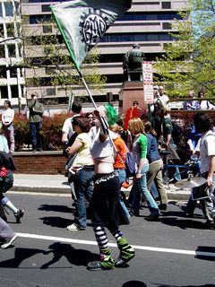 The Rude Mechanical Orchestra's standard bearer waves her flag high, and mightily!