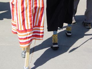 These two people wore stilts, complete with little shoes on the ends!