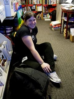 Sis poses for a photo at the Infoshop.