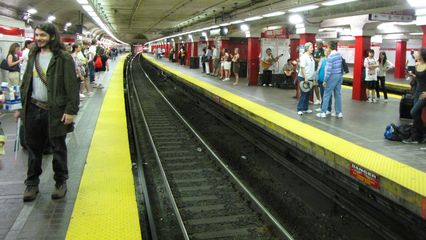 Waiting for a Red Line train at Park Street station, on our way to South Station.