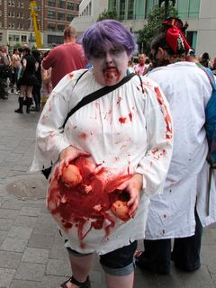 Purple Hair Anon pulled out her classic "Xenu Baby Mama" costume from the Ideal Org opening in DC the previous October.