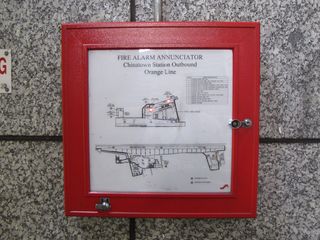 The fire alarm annunciator, showing the source of the alarm over a map of the station.