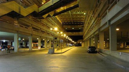 The bus loop, where the hotel shuttle picked up and dropped off its passengers, under the giant parking garage at Quincy Adams.