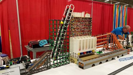 I saw a lot of animated displays at BrickFair.  This one, called Mindstorms Machines, took a ball through a course and then eventually loaded it onto a train, which brought it back to the start.  It reminded me of the Swiss Jolly Ball at the Museum of Science and Industry in Chicago.