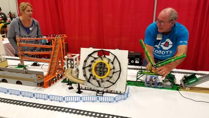 I saw a lot of animated displays at BrickFair.  This one, called Mindstorms Machines, took a ball through a course and then eventually loaded it onto a train, which brought it back to the start.  It reminded me of the Swiss Jolly Ball at the Museum of Science and Industry in Chicago.