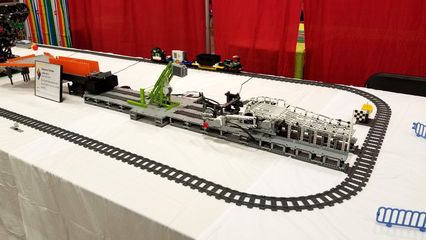 I saw a lot of animated displays at BrickFair.  This one, called Mindstorms Machines, took a ball through a course and then eventually loaded it onto a train, which brought it back to the start.  It reminded me of the Swiss Jolly Ball at the Museum of Science and Industry in Chicago.