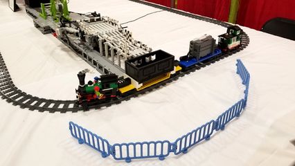 I saw a lot of animated displays at BrickFair.  This one, called Mindstorms Machines, took a ball through a course and then eventually loaded it onto a train, which brought it back to the start.  It reminded me of the Swiss Jolly Ball at the Museum of Science and Industry in Chicago.