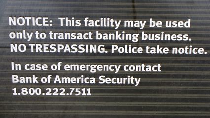 This sign struck me as rather heavy handed. This is on a Bank of America branch in the Loop area downtown. Specifically, the "NO TRESPASSING. Police take notice." part was what struck me as excessive. Really, Bank of America? Isn't this a bit much?