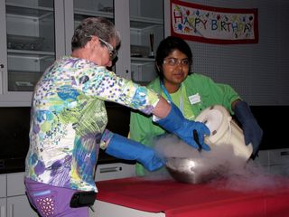 At the end of the liquid nitrogen demonstration, they made ice cream. I got Mom to volunteer to help with the demonstration. Here's Mom stirring the ice cream mix while the person running the show adds the liquid nitrogen, and then the remains of the ice cream after everyone had a cup of it.