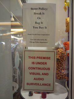 I saw these signs in the window of one of the stores at Navy Pier. The first thing I thought when I saw these was, "Why don't you tell us what you really think about your customers?"