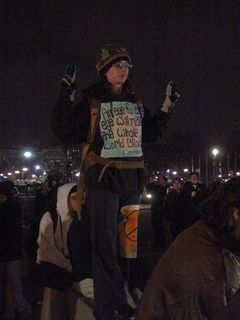 This demonstration at Union Station was full of familiar faces from earlier in the day, like this woman with her "An eye for an eye will make the whole world blind" sign standing on top of a concrete barricade.