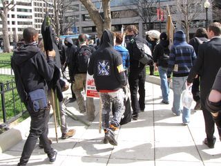 Leaving Farragut Square after being kicked out by the cops.