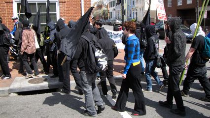 Crossing to the north side of M Street.