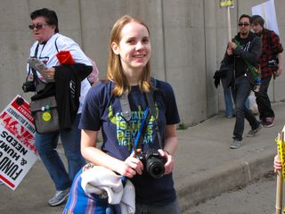 Mary stops to smile for a photo.