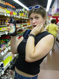 At the Da Hua Market, Sis models a bottle of Kikkoman soy sauce, getting special attention due to that parody Kikkoman advertisement found online.