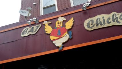 From January 4, a question for the group: does the fact that this is a chicken holding a plate containing a chicken drumstick make this chicken a cannibal?