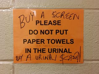 On May 19, I spotted this sign in the men's restroom at the library in Wheaton. Apparently paper towels in the urinals were a problem. And apparently, the idea of making a small investment in some urinal screens to stop the unwanted items from going into the plumbing eluded someone.