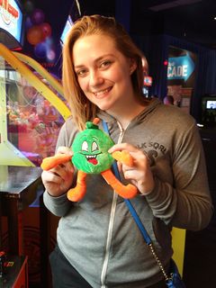 On November 11, I got together with Melissa, and we went up to Dave and Buster's at Arundel Mills. She won this little apple plush in a claw machine. She ended up giving it to Elyse.