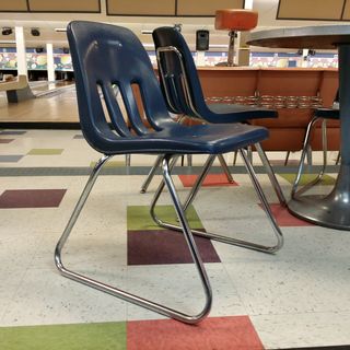 While at the bowling alley, one of the things that I noticed was the Virco sled-base chairs. Those brought me back to my middle school days, as they ordered a bunch of these when they enlarged the building in 1993. However, unlike these, which use the sled base directly on the floor, the chairs at my old middle school were retrofitted with floor runners to prevent tile damage.