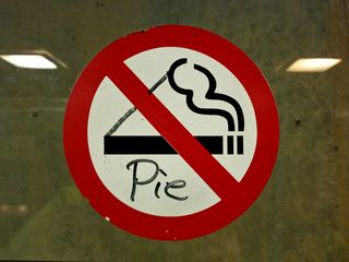 On December 6, in the elevator at the Rockville Metro station, I spotted this. "No smoking" is transformed to "no pie".