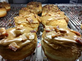 All of us swung by a local donut shop for dessert after dinner, and I was quite surprised to find these in the case. These are maple and bacon donuts. I had one of these, and they were actually quite good.