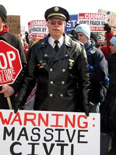 Captain Ray Lewis, in his police uniform, present at the Forward on Climate rally.