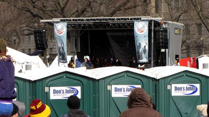 The placement of some of the portable toilets was unfortunate, however, as a row of them was placed in the middle of the rally, across the middle of the rally site. This blocked the view of the stage from a number of areas. Perhaps these toilets could have been placed to the side instead, like others were?