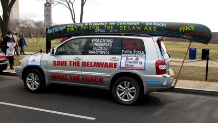 This car was the last word in anti-fracking messaging. The words "SAVE THE DELAWARE" and "WHAT THE FRACK" were printed on the sides of the car, the rear window had an anti-fracking message and a phone number, the side windows had messages on them, the canoe on the roof was painted with even more anti-fracking messaging, and various signs from the rally were attached to the vehicle as well.