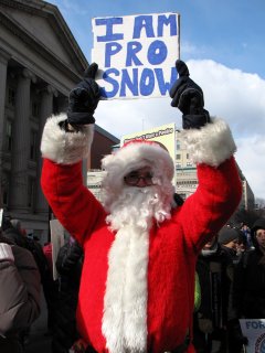 One person dressed up as Santa Claus, which, despite its being February, fit the theme perfectly. After all, if Santa Claus came to an environmental rally, he would take a strong stand on snow, wouldn't he? I especially loved the "COAL IS NAUGHTY" sign. Coal is not exactly a clean fuel, after all.