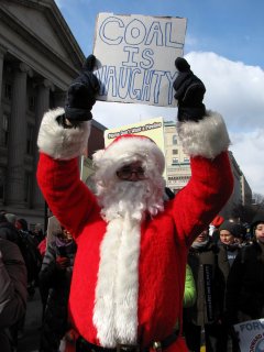 One person dressed up as Santa Claus, which, despite its being February, fit the theme perfectly. After all, if Santa Claus came to an environmental rally, he would take a strong stand on snow, wouldn't he? I especially loved the "COAL IS NAUGHTY" sign. Coal is not exactly a clean fuel, after all.