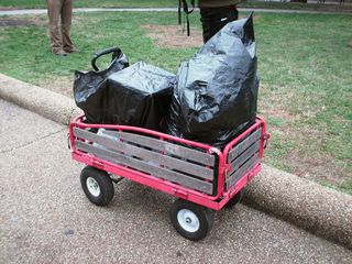 The sound truck is all ready to go, covered in plastic to protect against the rain.