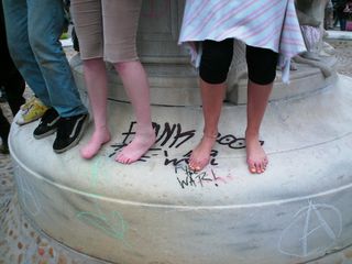 Dancing on the fountain.