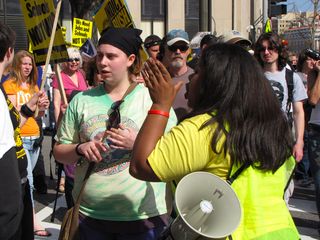 ANSWER "security" volunteer upset with us that we hijacked her march.