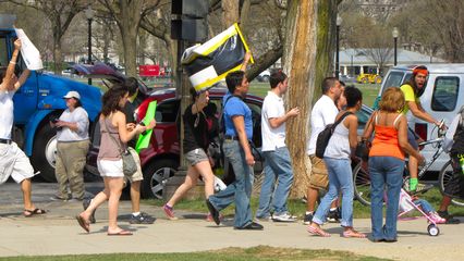 Other groups head to the site of the March for America, while SDS looks on.