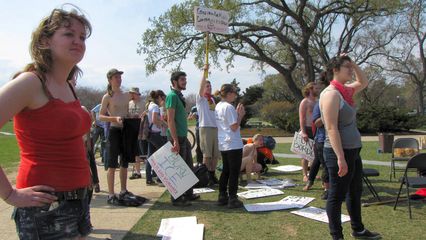 Other groups head to the site of the March for America, while SDS looks on.