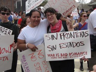 Rachel poses for a photo with another demonstrator.