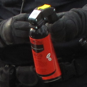 Detail of the cans from the previous photo. Note that the safety pin is missing on at least one can (i.e. it was ready to fire), and note that "MK-9" and a brand logo is readable on the can.