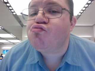 Doing the "Myspace face". As a testament to how stupid that expression is, a friend on Facebook described it as, "Look[s] like ya got caramel in a molar."