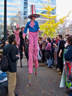 And the people on stilts are up and on their way!