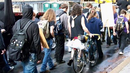 Marching through the streets of downtown Washington, protesting the capitalist system under which we live.